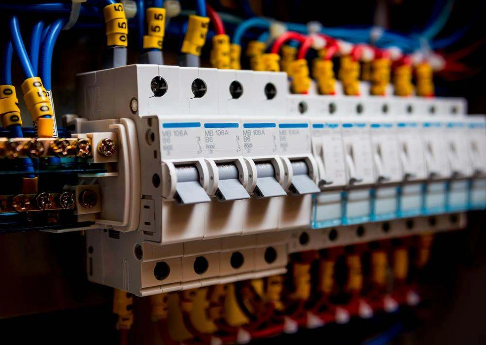 Circuit breakers in a switchboard installed by a Gold Coast electrician